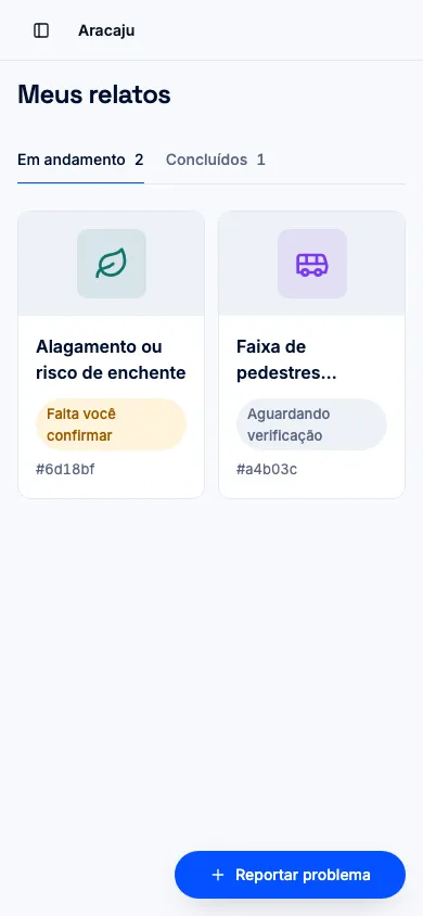 Lista Meus relatos, com as abas Em andamento e Concluídos e os chamados em cartões com foto, em celular